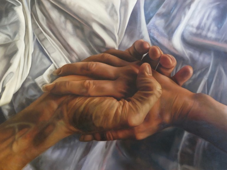 Katherine Edney's painting 'Ariel', depicting two hands holding on a bed.
